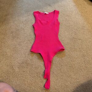 pink body suit
